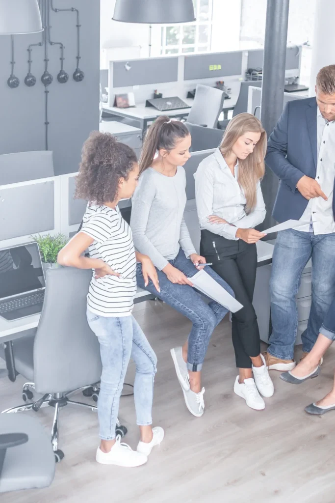 peer group analysis team members working in office