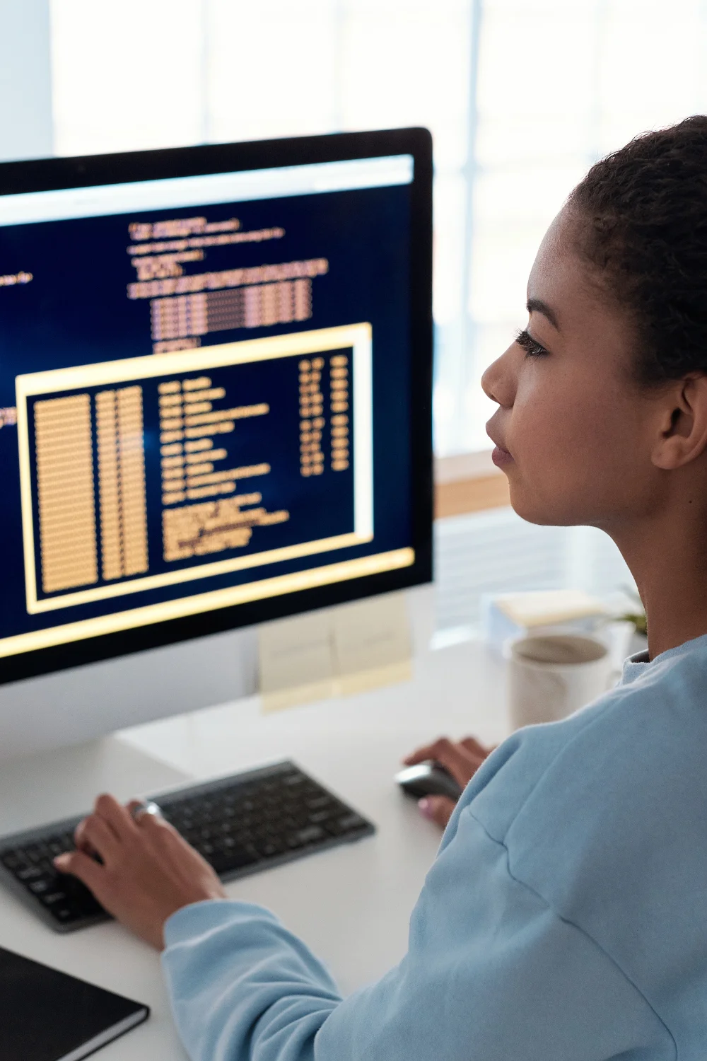 iterative testing woman in front of computer