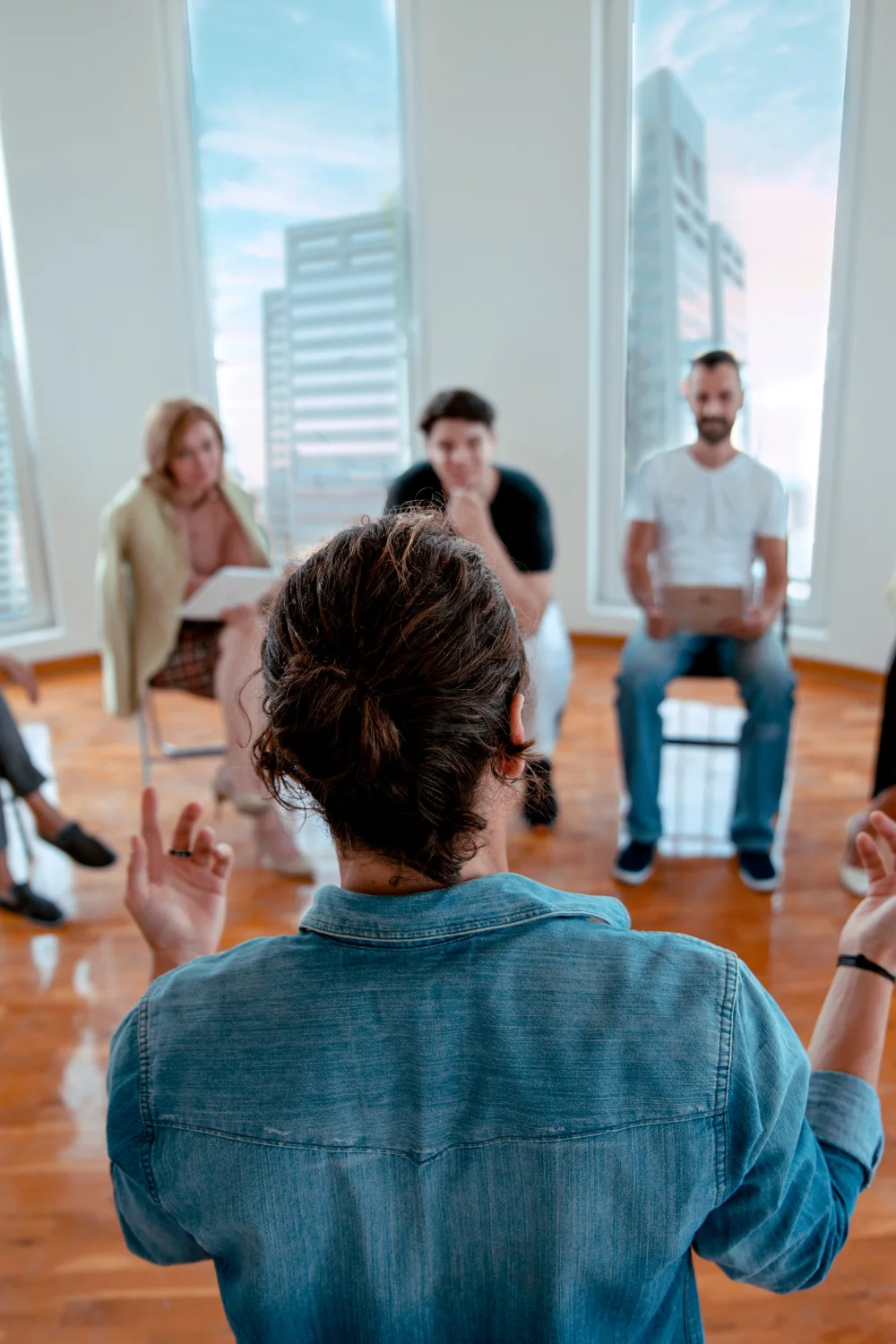 security awareness training program example_ man giving lecture in circle